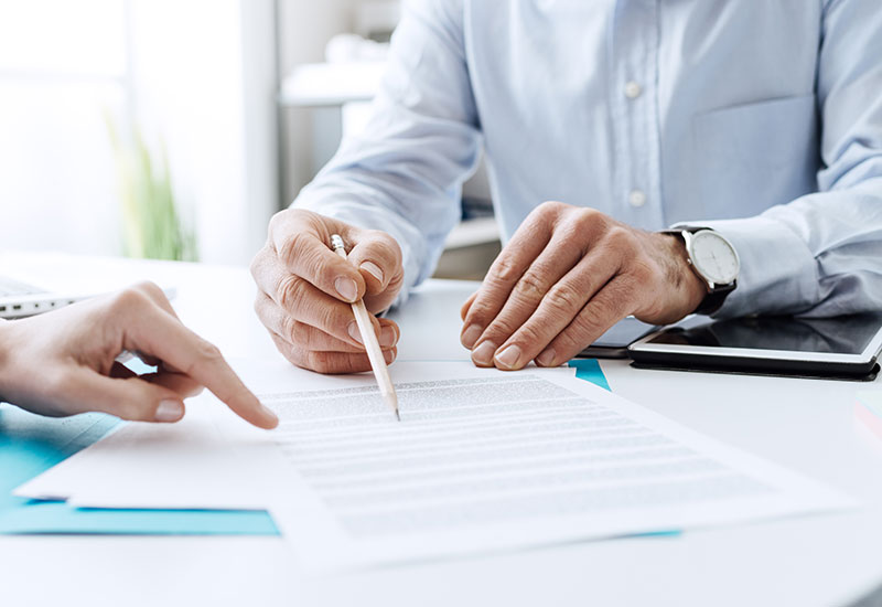 Insurance provider signing documents